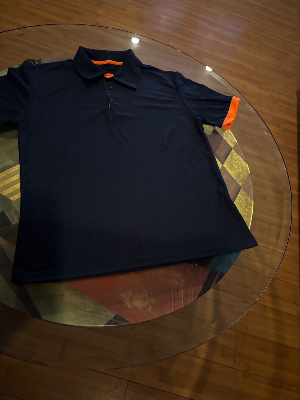 Men's Navy Polo with Orange Accent Collar and Sleeve  35% cotton 65% polyester